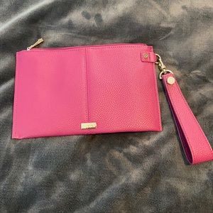 31 Jewel Plum Wristlet. Never used.